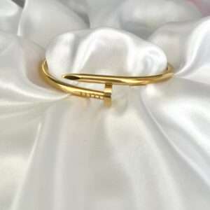 BRACELETE PREGO AÇO DOURADO